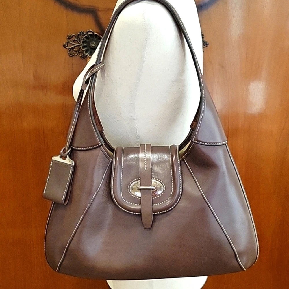 Dooney & Bourke 1975 shoulder/hobo leather bag like new, never used w/bag!
